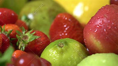 Background juicy and fresh herbs, fruit and vegetables on ice