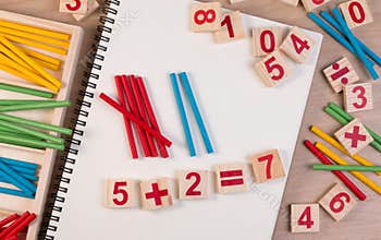 Educational kids math toy wooden board stick game counting set in kids math class kindergarten.