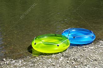 Inflatable rings by river