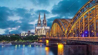 Cologne Cathedral and Hohenzollern Bridge in evening