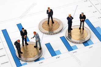 Businessman and money over a chart