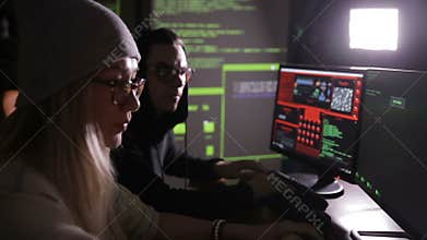 The hacker team breaking security system. Cybercrime, cyber security concept.