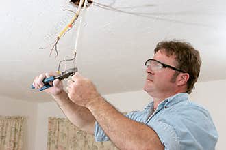 Electrician Straightens Wire