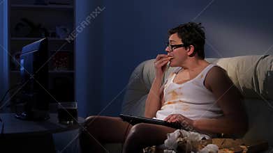 Evening leisure normal gamer: pizza, sofa, computer
