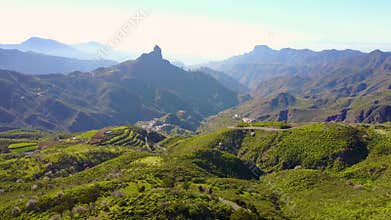 Flying over lush landscape and mountains at Gran Canaria