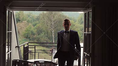 Young Man Coming into Hotel Room