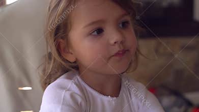 Caucasian kid wearing in white t-shirt have fun.