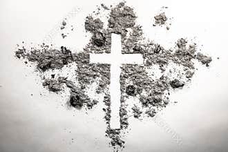Ash wednesday cross, crucifix made of ash, dust as christian rel