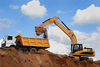 Excavator and rear-end tipper