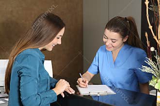 Nurse or dentist attending a client
