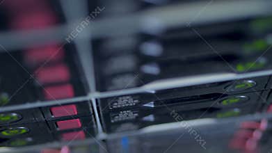 A close top view on server hard drives writing data.