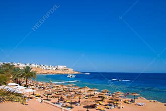 Sand beach of tropical hotel