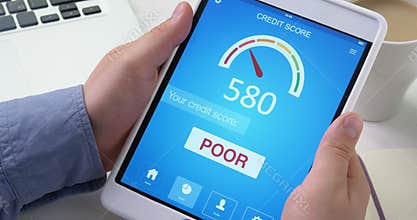 Checking poor credit score on digital tablet