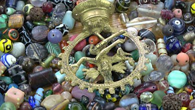 Dancing god lord Shiva brass sculpture rotating on ancient indian beads