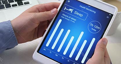 Checking sleep monitoring on health app on the digital tablet