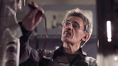 Man working with electric tools.