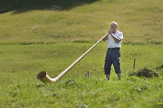 Old man singing at Alpen horn