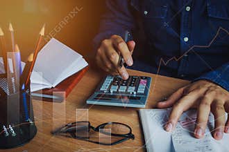 Asian man accountant or banker calculate finances / savings money or economy concept.