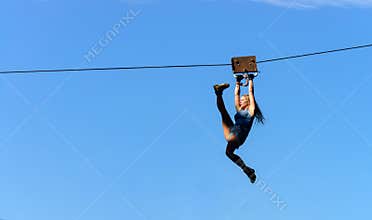 Stuntman is landing with cable