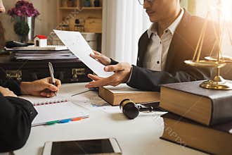 The hard work of an asian lawyer in a lawyer office.