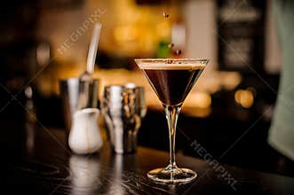 Bartender decorated espresso cocktail drink white foam coffee bean