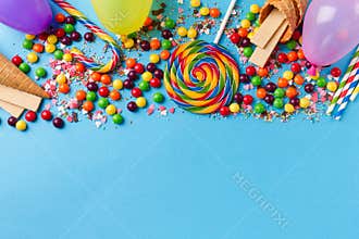 Tasty appetizing Party Accessories on Bright Blue Background