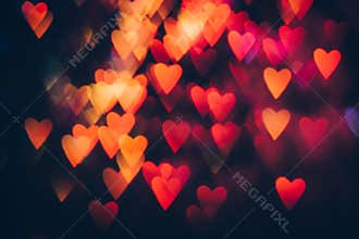 Abstract background of colorful hearts in motion