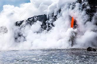 KiÌ„lauea volcano lava flow pours into ocean in Hawaii