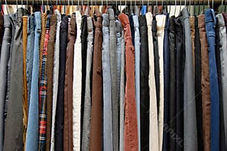 Used clothing on thrift store rack
