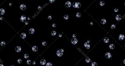 Soap bubbles floating on black background, bubble blower