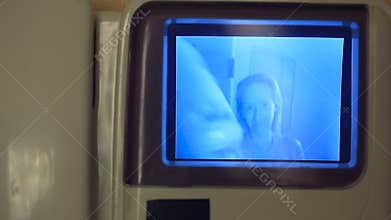 The girl who came to visit on the screen of the video intercom.
