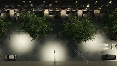 Night city street with brownstones and cars aerial 4K