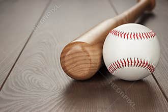 Baseball bat and ball