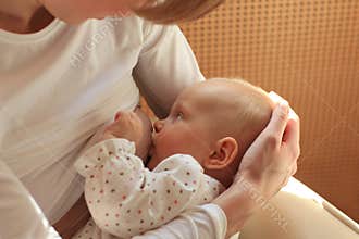 Mother breastfeeding baby