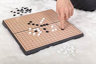 Boardgame reversi game in action