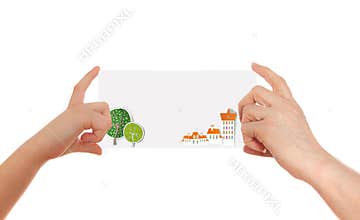 Two hands holding paper with abstract city background and space for text.