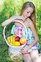 Happy girl and healthy vegetarian food, fruit