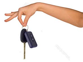 Humans hand holding car keys