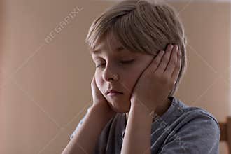 Child with eyes closed