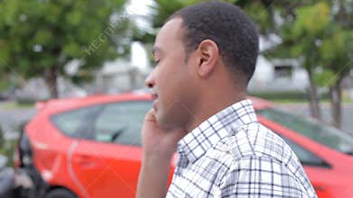 Male Driver Making Phone Call After Traffic Accident