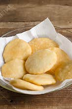Tray of freshly fried arepas.