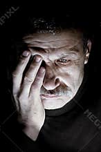 Portrait of aged man in depression