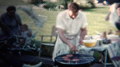 (8mm Vintage) 1954 Dad Making Hamburgers For Lunch. Iowa, USA.