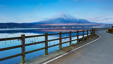4K Timelapse of Moon set and Sun rise over Mt. Fuji at Yamanaka lake , Japan