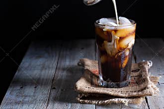 Iced coffee in a tall glass
