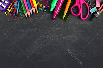 Chalkboard with school supplies top border