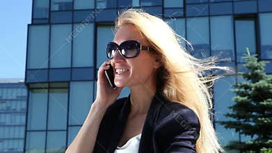Business woman talking on cellular phone