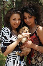 Fashionable women with pet dog