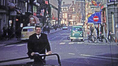 COPENHAGEN - 1966: The mod 60's streets of a busy section of the city.