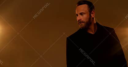 Portrait of handsome young bearded man